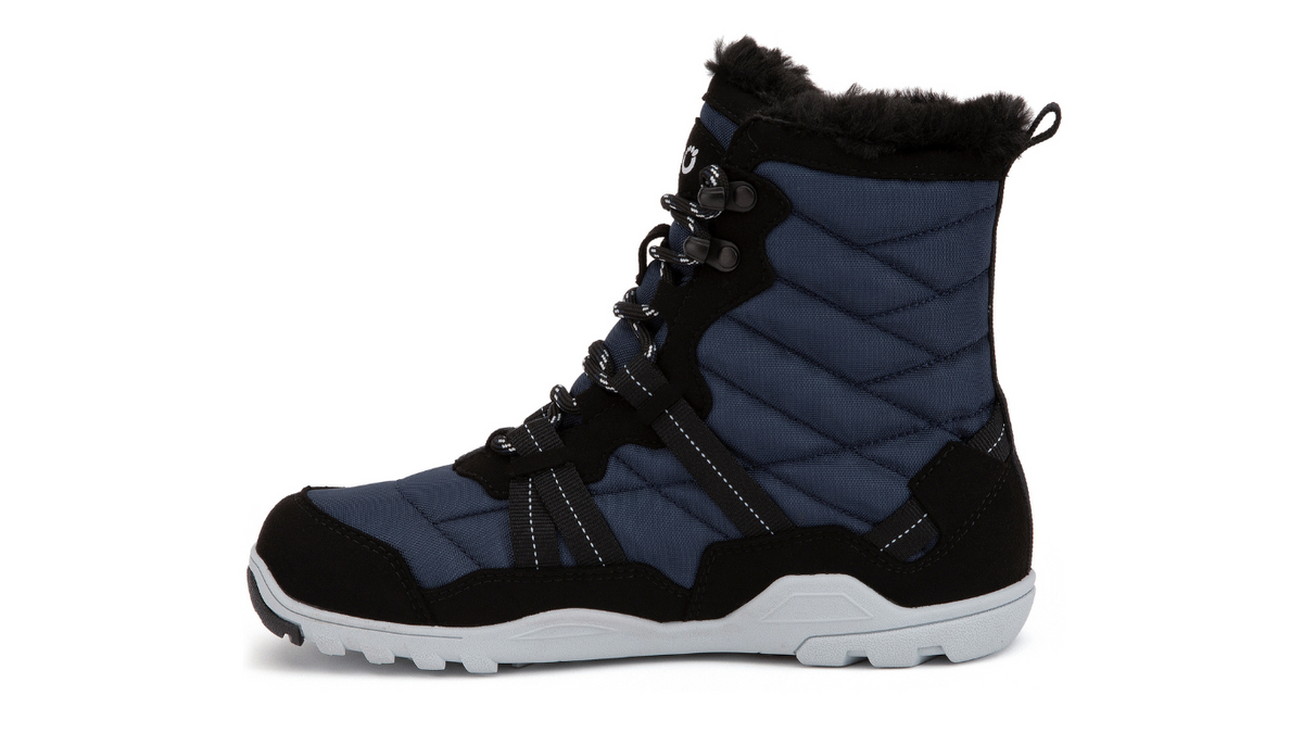 Barfußwinterstiefel, geschlossene Zehen und geschlossener Fersenbereich, Schnürung mit Ösen, profilierte Sohle, Einzelschuh, Seitenansicht innen