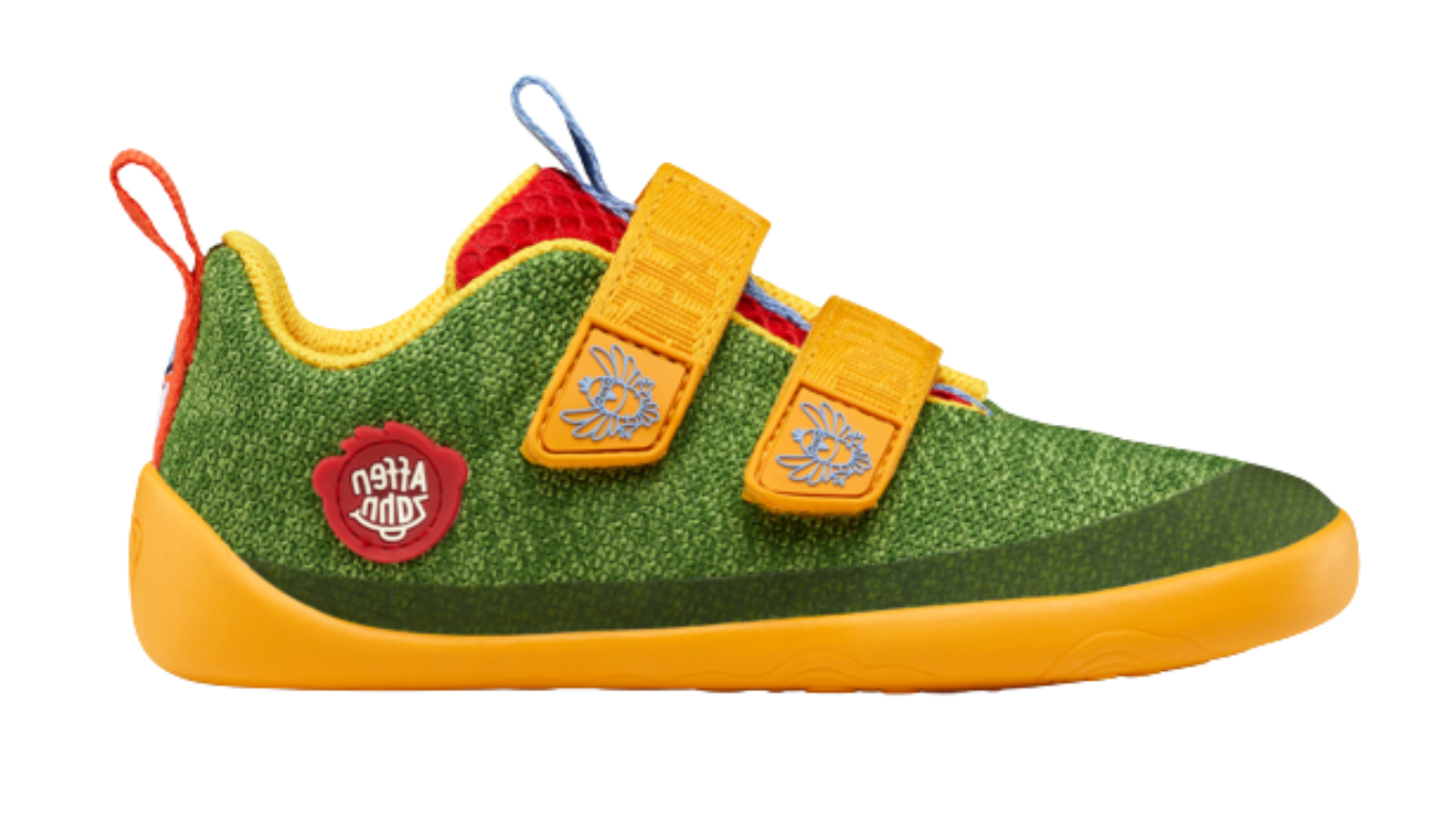 Kinder Barfußschuh mit geschlossener Zehenbox, breiter Vorderfußform und Klettverschlüssen, Seitenansicht außen