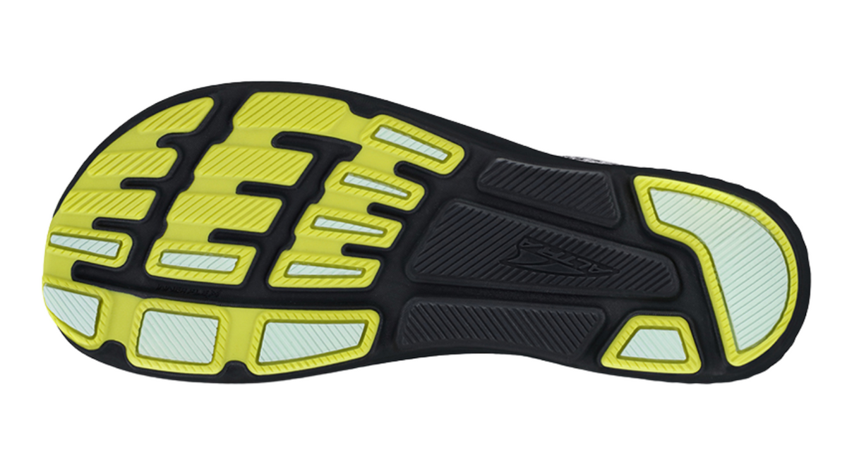 Laufschuh, Ansicht von unten. Segmentierte Laufsohle mit ausgeprägten Dämpfungselementen.