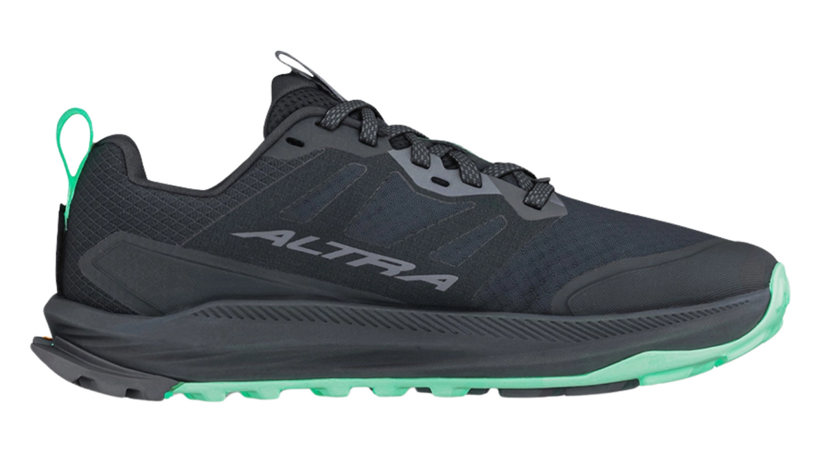 Trailrunning-Schuh für Erwachsene mit geschlossener Zehenbox, geschlossener Ferse, Schnürung, profilierter Sohle, Seitenansicht außen.