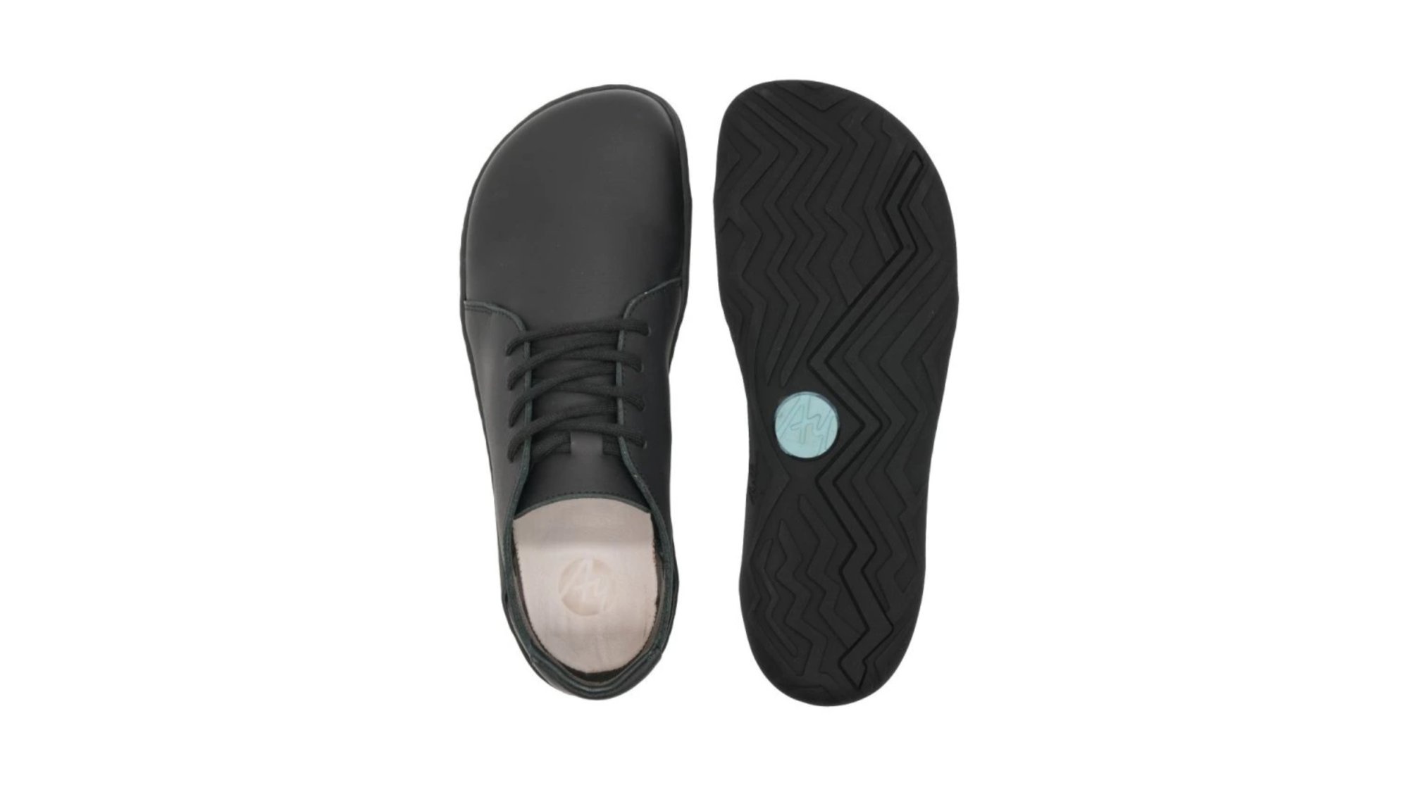 Barfußschuh für Erwachsene mit flacher, flexibler Sohle und strukturiertem Profil, Ansicht von unten.