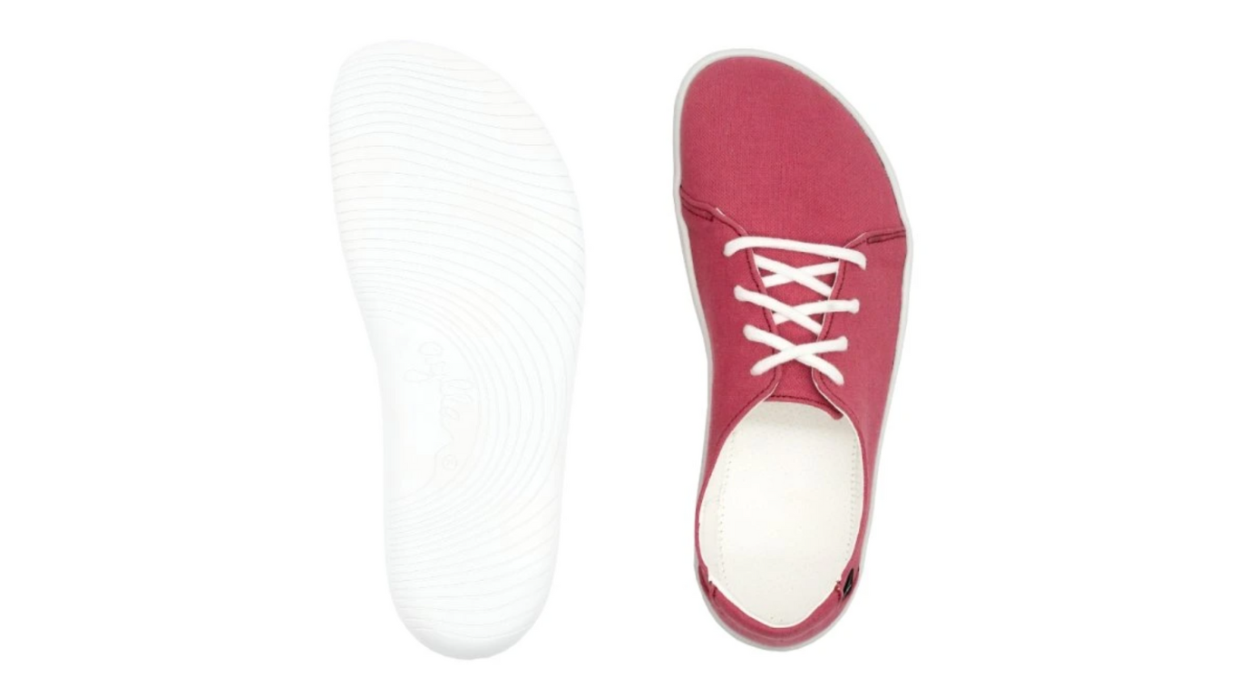 Barfußschuh, Ansicht von unten und Draufsicht. Flache Laufsohle, Innenform mit breitem Vorfuß sichtbar.