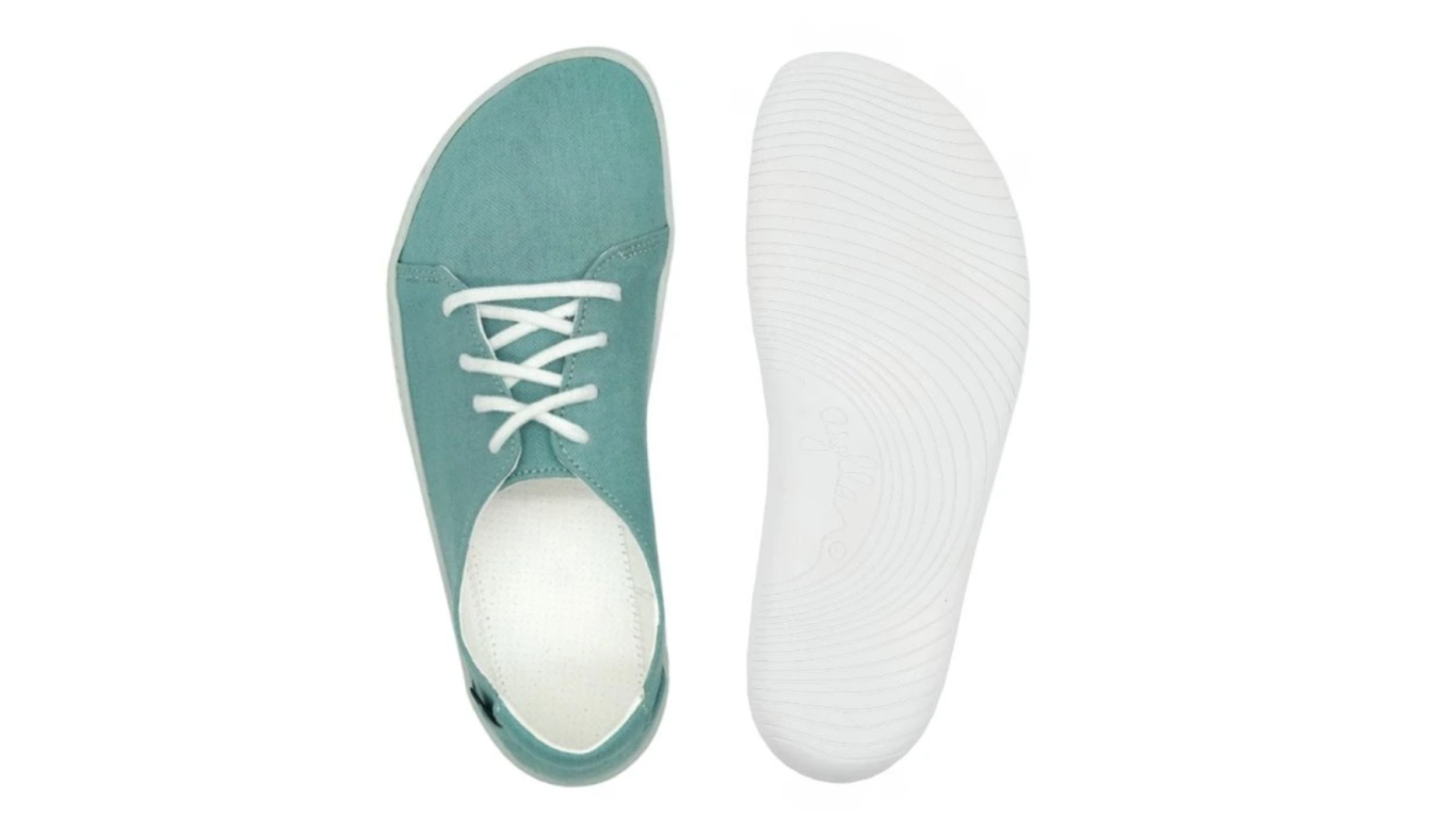 Barfußschuh, Ansicht von unten und Draufsicht. Flache Laufsohle, Innenform mit breitem Vorfuß sichtbar.