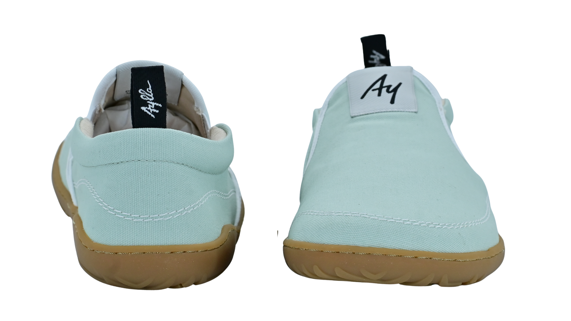 Barfußschuh mit elastischem Einstieg, breiter Zehenbox und flexibler Sohle, Vorder- und Rückansicht als Paar