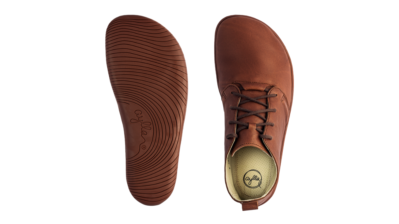 Barfußstiefel, Ansicht von unten. Laufsohlenprofil und flacher Fersenbereich sichtbar.