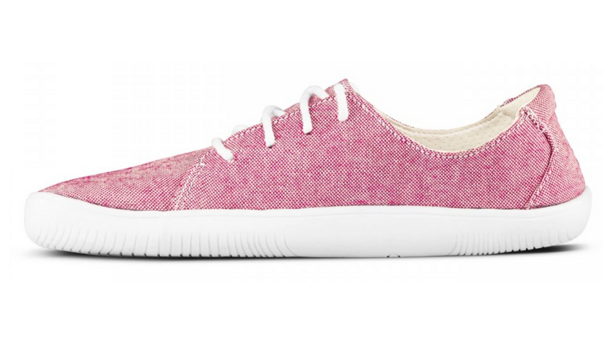 Barfußschuh, Seitenansicht außen. Geschlossener Schuh mit Schnürung, flache Sohle, gleichmäßige Sohlenhöhe.