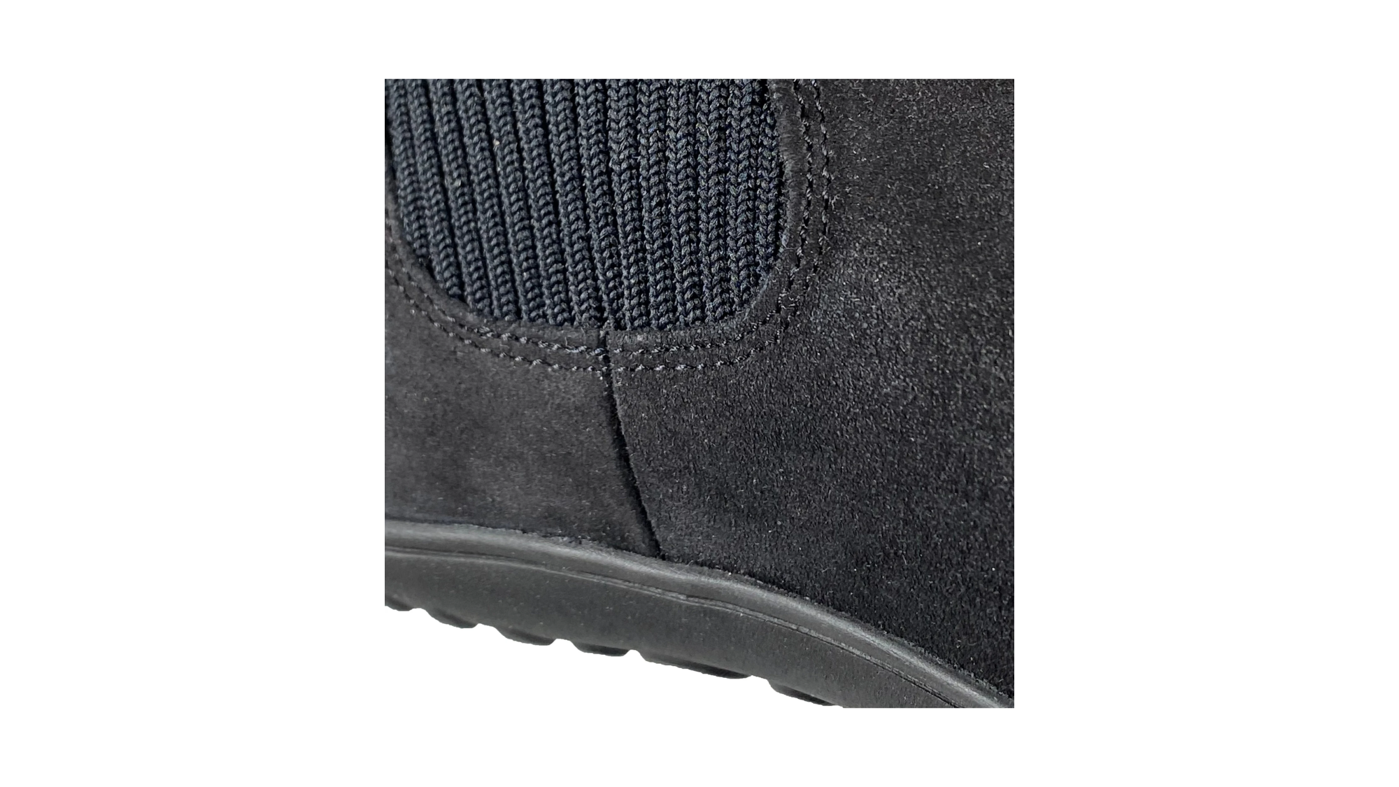 Barfußstiefelette für Erwachsene mit elastischem Schaft und geschlossener Ferse, Detailansicht.