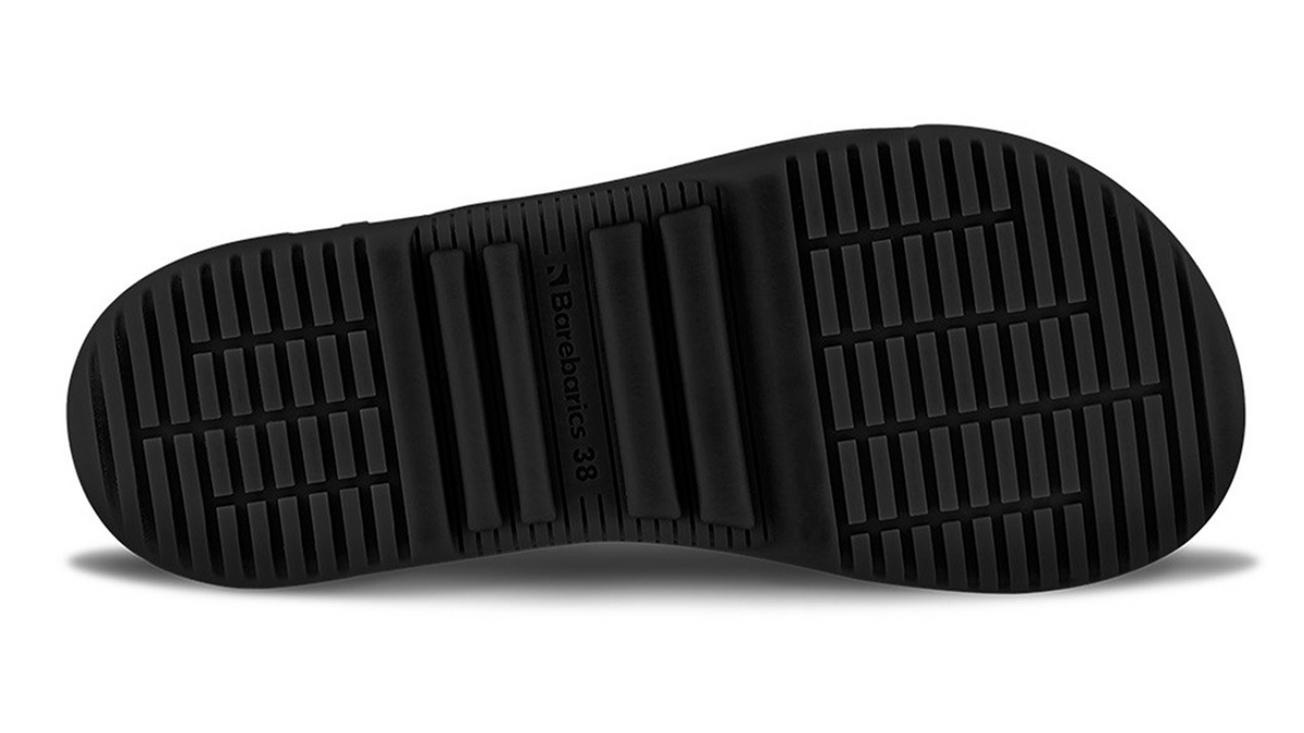 Barfußschuh für Erwachsene mit strukturierter, flexibler Sohle und Profil, Ansicht von unten.