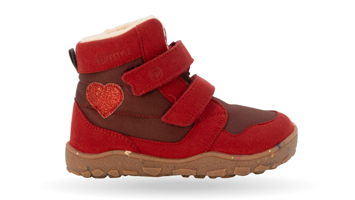 Barfußwinterstiefel mit zwei Klettverschlüssen, breite Zehenbox, flexible Sohle, geschlossener Fersenbereich, hoher Schaft, Seitenansicht außen