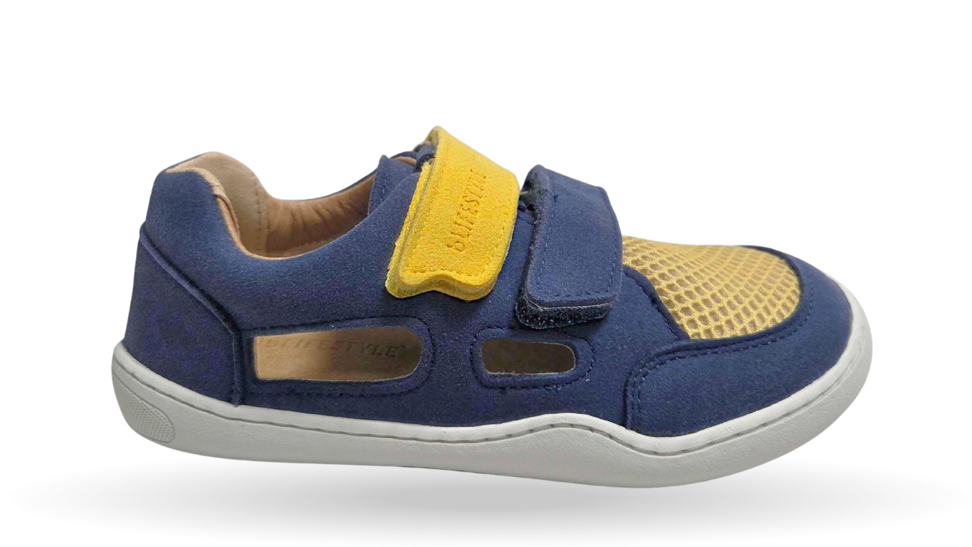 Barfußsandale mit zwei Klettverschlüssen, breite Zehenbox, flexible Sohle, seitliche Öffnungen, geschlossener Fersenbereich, Seitenansicht außen
