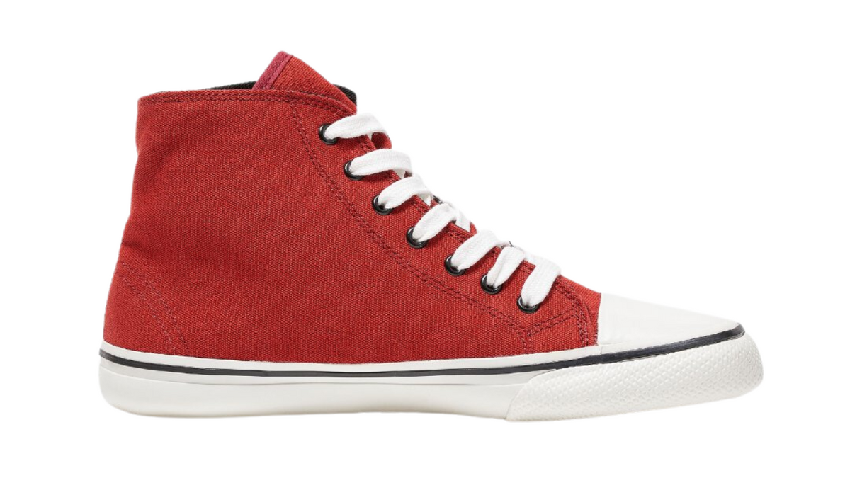 Barfußschuh für Erwachsene mit breiter Zehenbox, geschlossenem Zehenbereich, geschlossener Ferse, Schnürung, flacher flexibler Sohle, Seitenansicht innen.