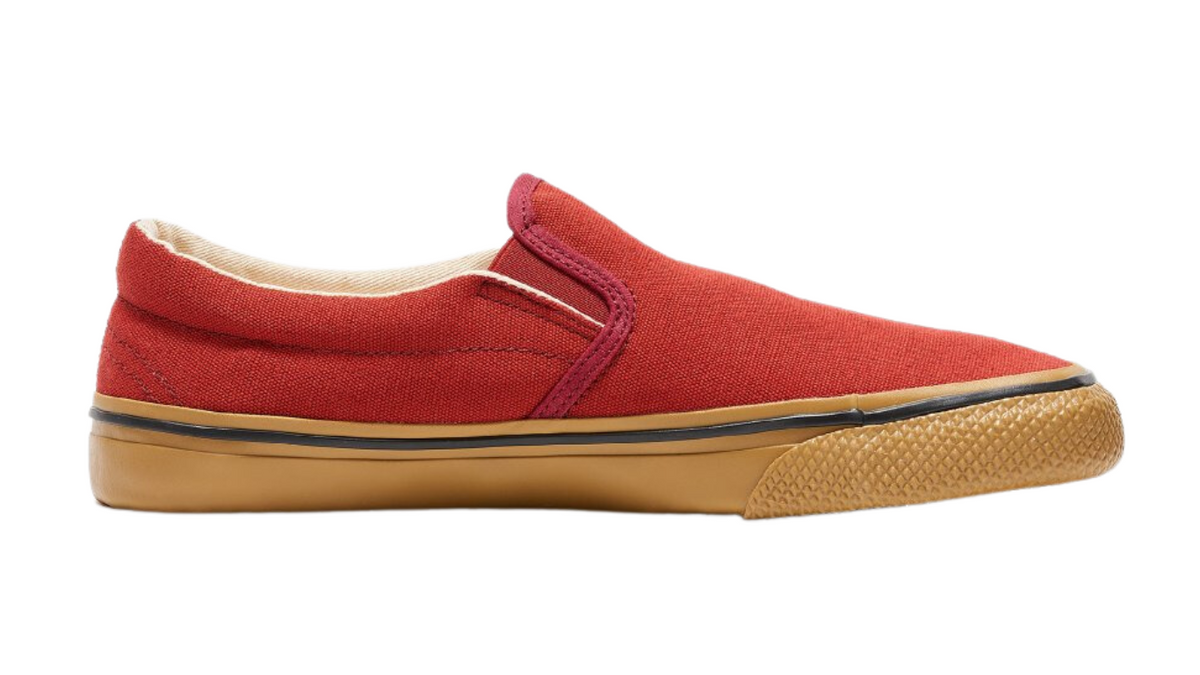 Barfußschuh für Erwachsene mit breiter Zehenbox, geschlossenem Zehenbereich, geschlossener Ferse, Schlupfform ohne Verschluss, flacher flexibler Sohle, Seitenansicht innen.