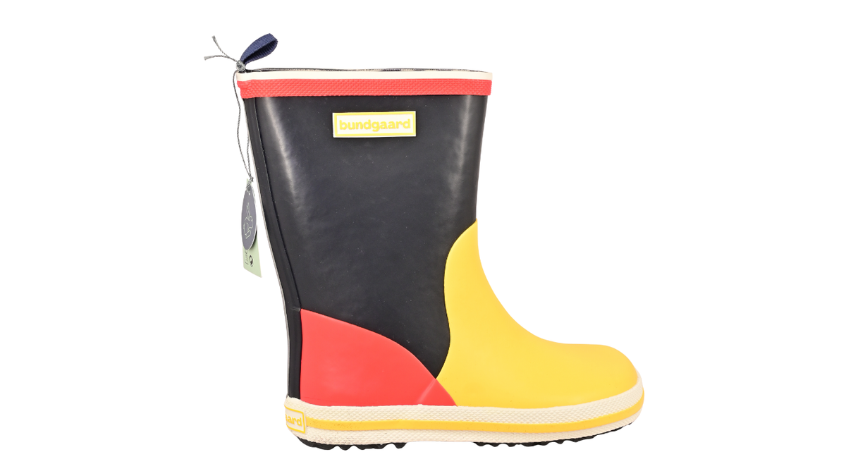 Gummistiefel für Kinder, hoher Schaft, geschlossene Zehen und geschlossener Fersenbereich, profilierte Sohle, Einzelschuh, Seitenansicht außen