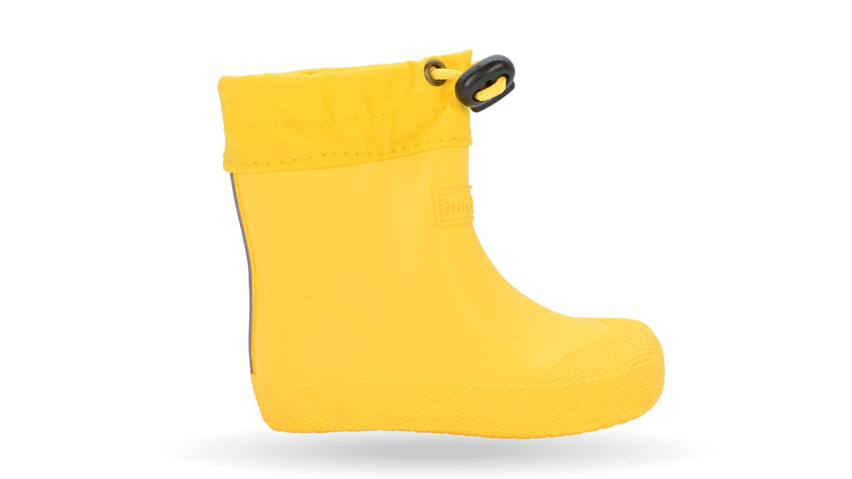 Barfußgummistiefel mit breiter Zehenbox, flexibler Sohle, geschlossenem Schaft mit Kordelzug, geschlossener Fersenbereich, Seitenansicht außen, einzelner Schuh