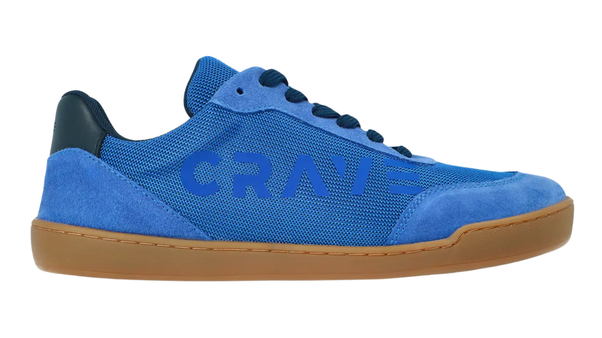 Barfußschuh für Kinder mit Schnürung, breite Zehenbox, flache flexible Sohle, geschlossene Zehen und Ferse, Seitenansicht außen