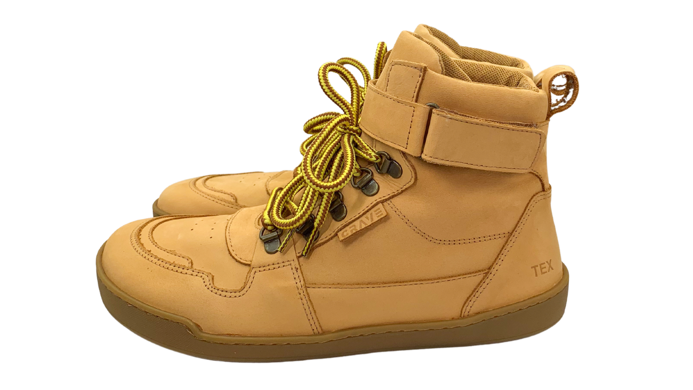 Kinder Barfußschuh mit breiter Zehenbox, Schnürung und flacher Sohle, Seitenansicht außen