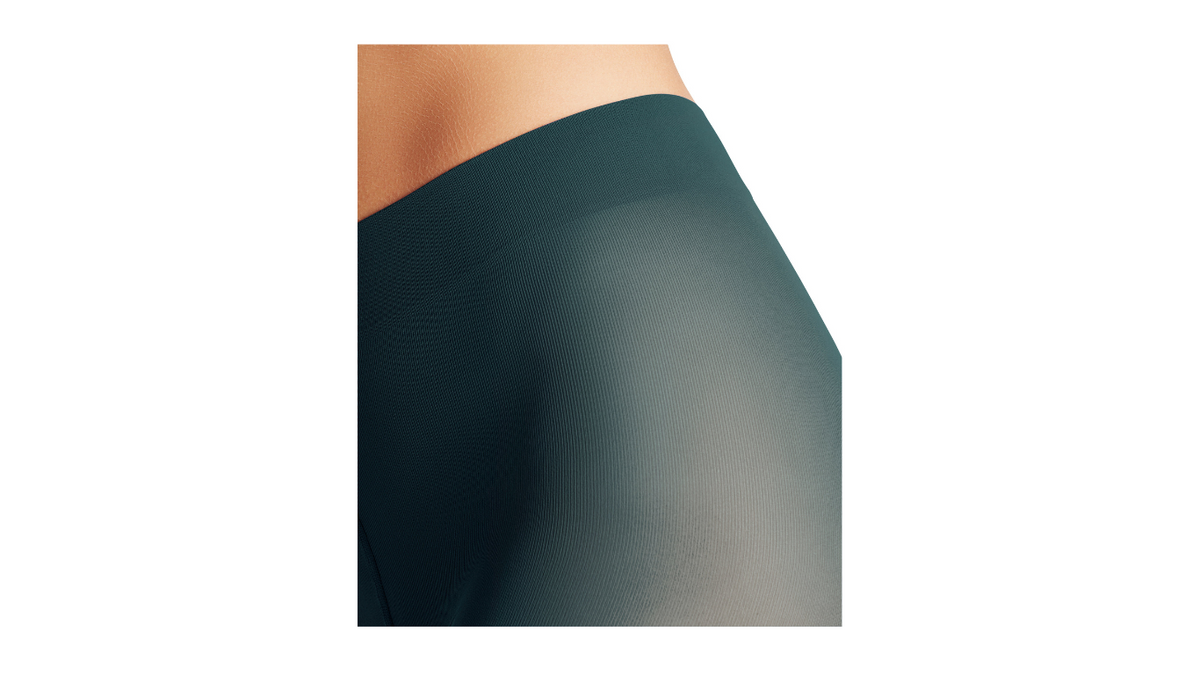 Damen-Leggings mit elastischem Bund getragen am Bein, Detailansicht.