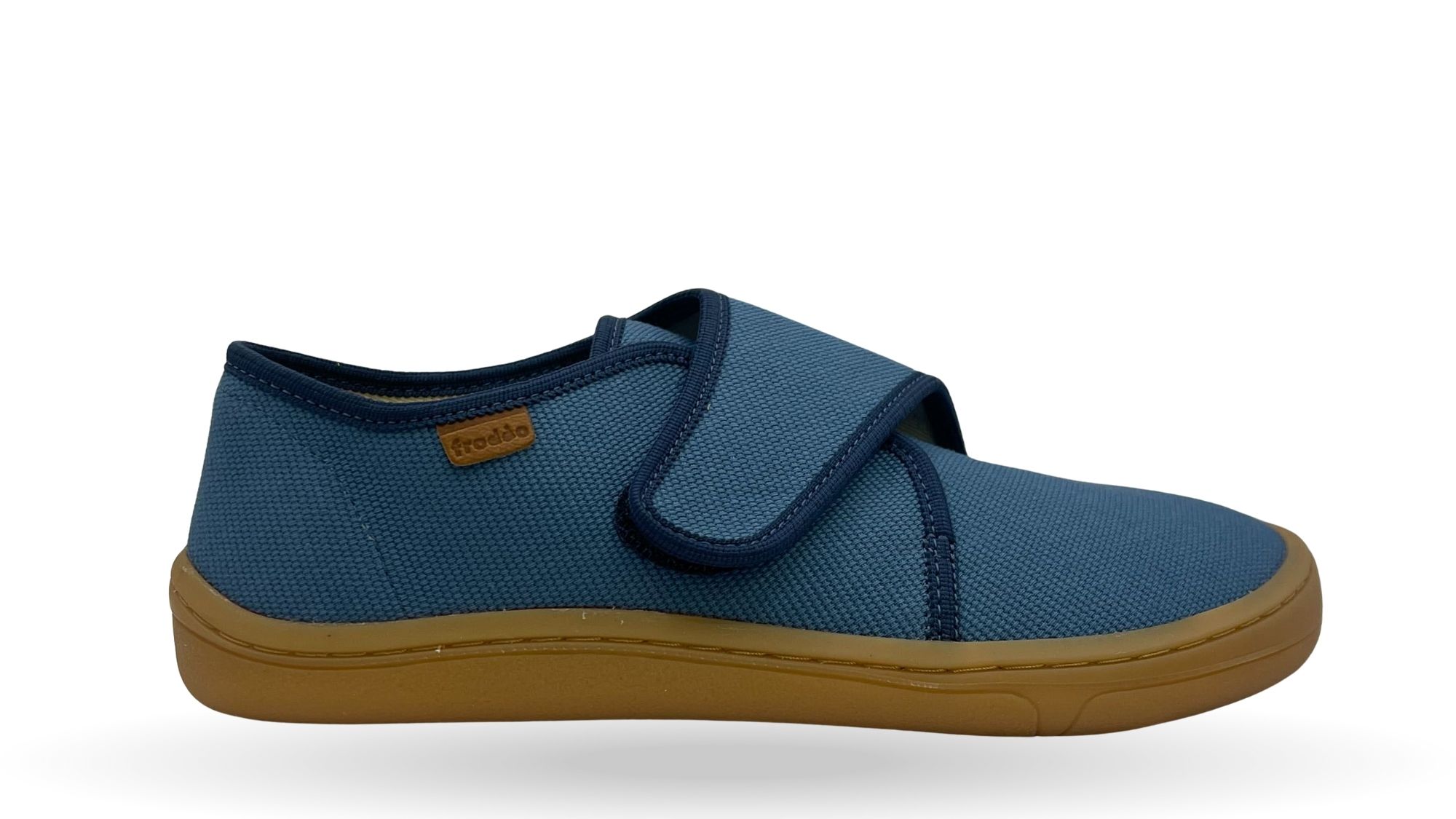 Barfußschuh mit Klettverschluss, geschlossene Zehen und geschlossener Fersenbereich, Seitenansicht außen, einzelner Schuh