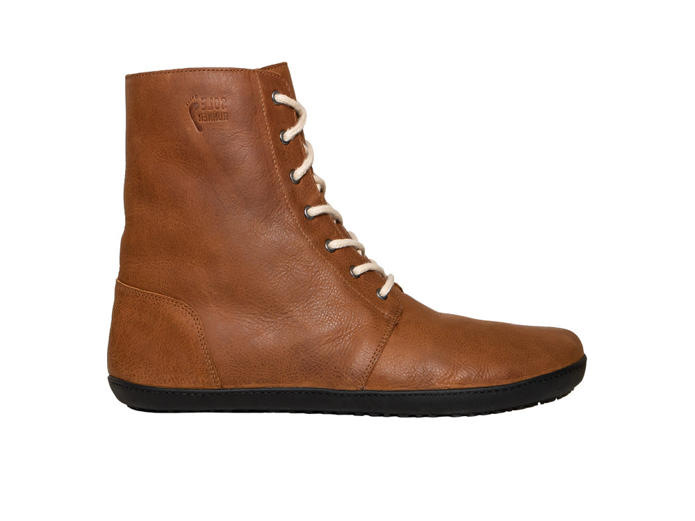 Barfußwinterstiefel, geschlossene Zehen und geschlossener Fersenbereich, Schnürsenkel, flexible Sohle, einzelner Schuh, Seitenansicht außen