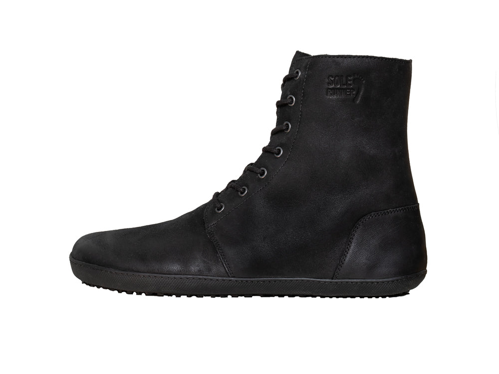 Barfußwinterstiefel, geschlossene Zehen und geschlossener Fersenbereich, Schnürsenkel, flexible Sohle, einzelner Schuh, Seitenansicht innen