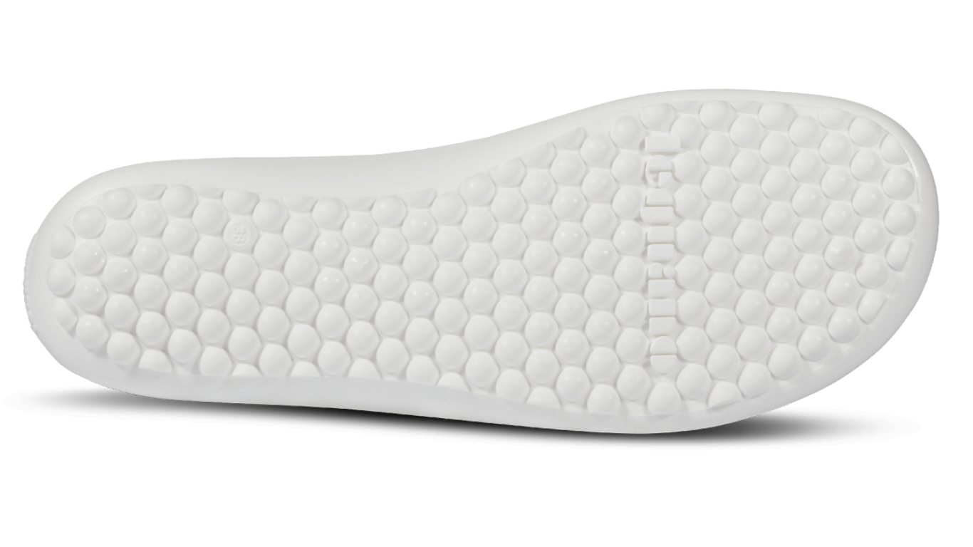 Barfußschuh mit flexibler Laufsohle und runden Profilnoppen, Ansicht von unten