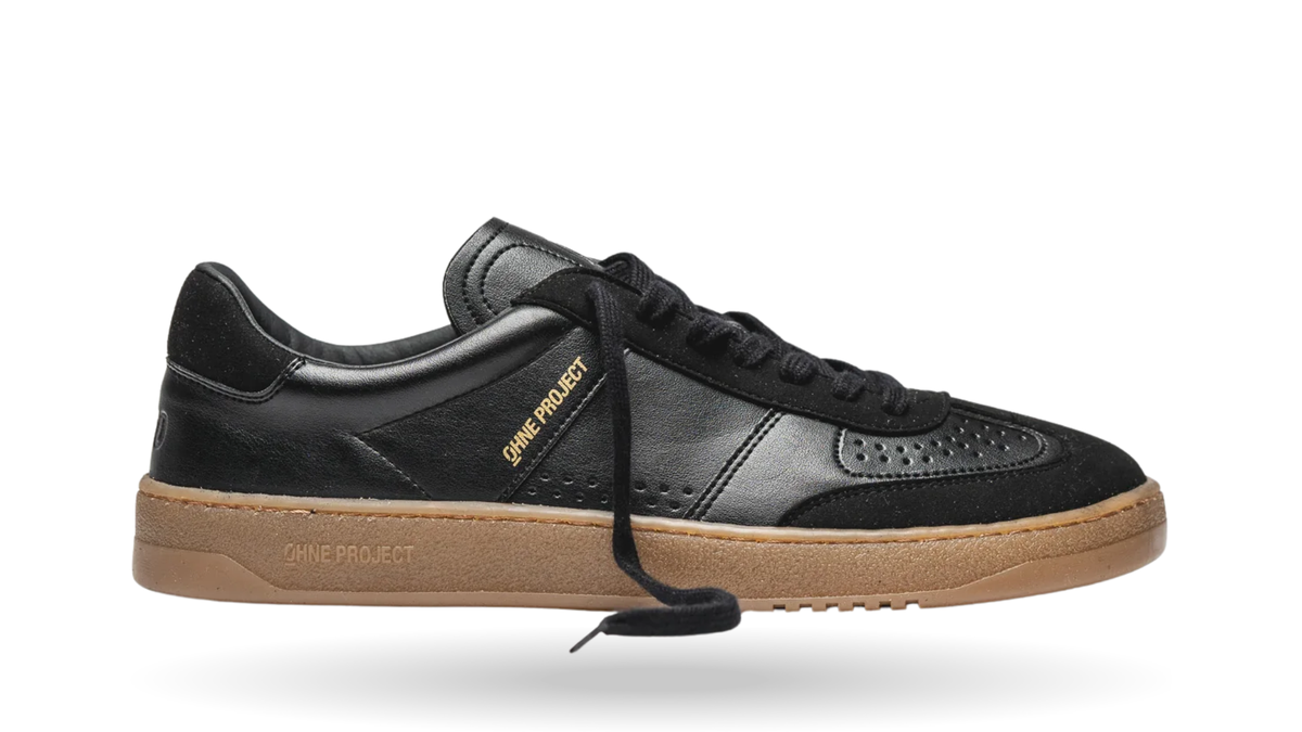 Barfußsneaker für Erwachsene mit Schnürung, breiter Zehenbox und flexibler Sohle, Seitenansicht außen