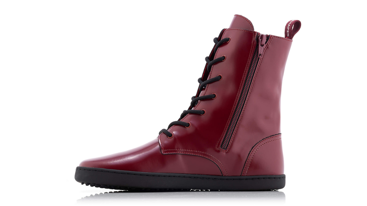 Barfußstiefel mit breiter Zehenbox, flexibler Sohle und Schnürung, geschlossene Zehen und geschlossener Fersenbereich, einzelner Schuh, Seitenansicht innen