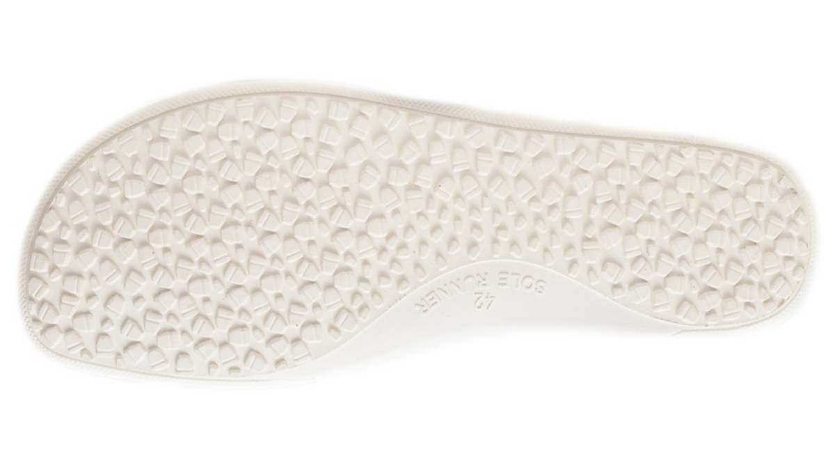 Barfußschuh, geschlossene Zehen und geschlossener Fersenbereich, Schnürung mit Ösen, flexible Sohle, Einzelschuh, Ansicht von unten