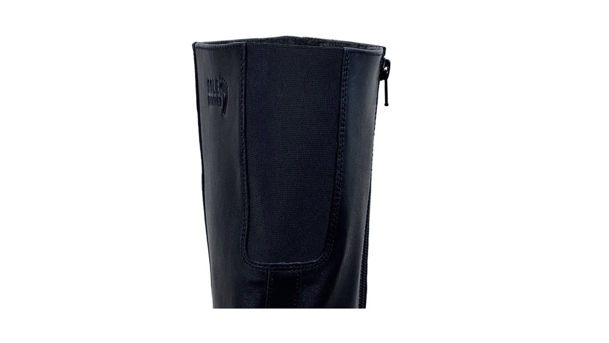 Barfußstiefel für Erwachsene, geschlossene Zehenpartie, geschlossener Fersenbereich, hoher Schaft, flache Sohle, Detailansicht Schaft mit elastischem Einsatz