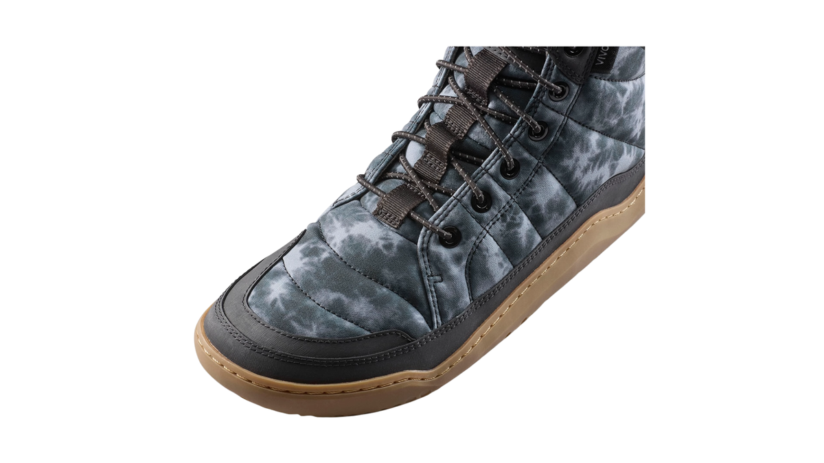 Barfußwinterstiefel, geschlossene Zehen und geschlossener Fersenbereich, Schnürung mit Ösen, profilierte Sohle, Detailansicht Ziernähte
