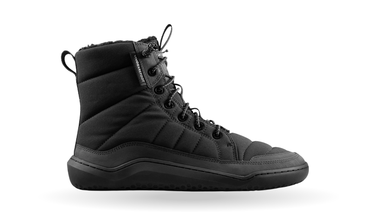 Barfußwinterstiefel, geschlossene Zehen und geschlossener Fersenbereich, Schnürung mit Ösen, profilierte Sohle, Seitenansicht außen, Einzelschuh