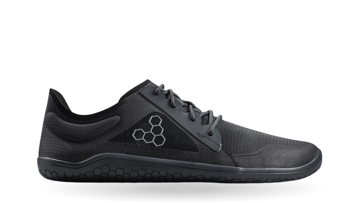 Barfußsneaker mit Schnürung, Mesh-Einsätzen und geschlossener Zehenpartie in Seitenansicht außen