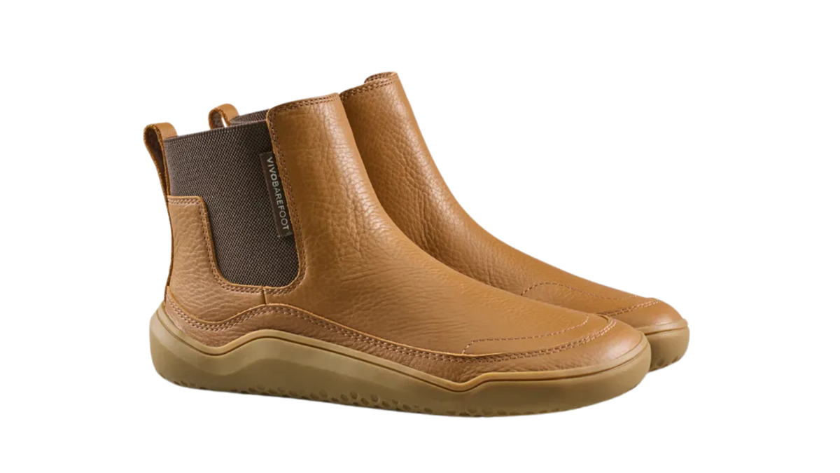 Kinder-Chelsea-Barfußstiefel als Paar mit breiter Zehenbox, elastischen Seiteneinsätzen und geschlossenen Zehen, schräge Vorderansicht