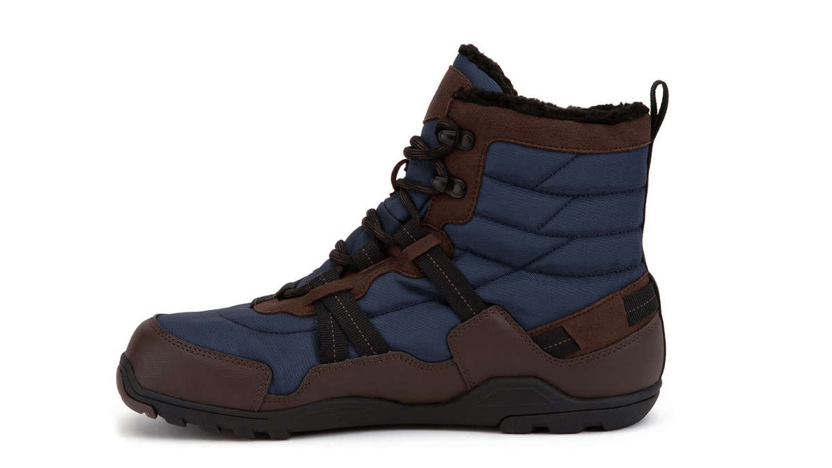 Barfußwinterstiefel, geschlossene Zehen und geschlossener Fersenbereich, Schnürung mit Ösen, profilierte Sohle, einzelner Schuh, Seitenansicht innen