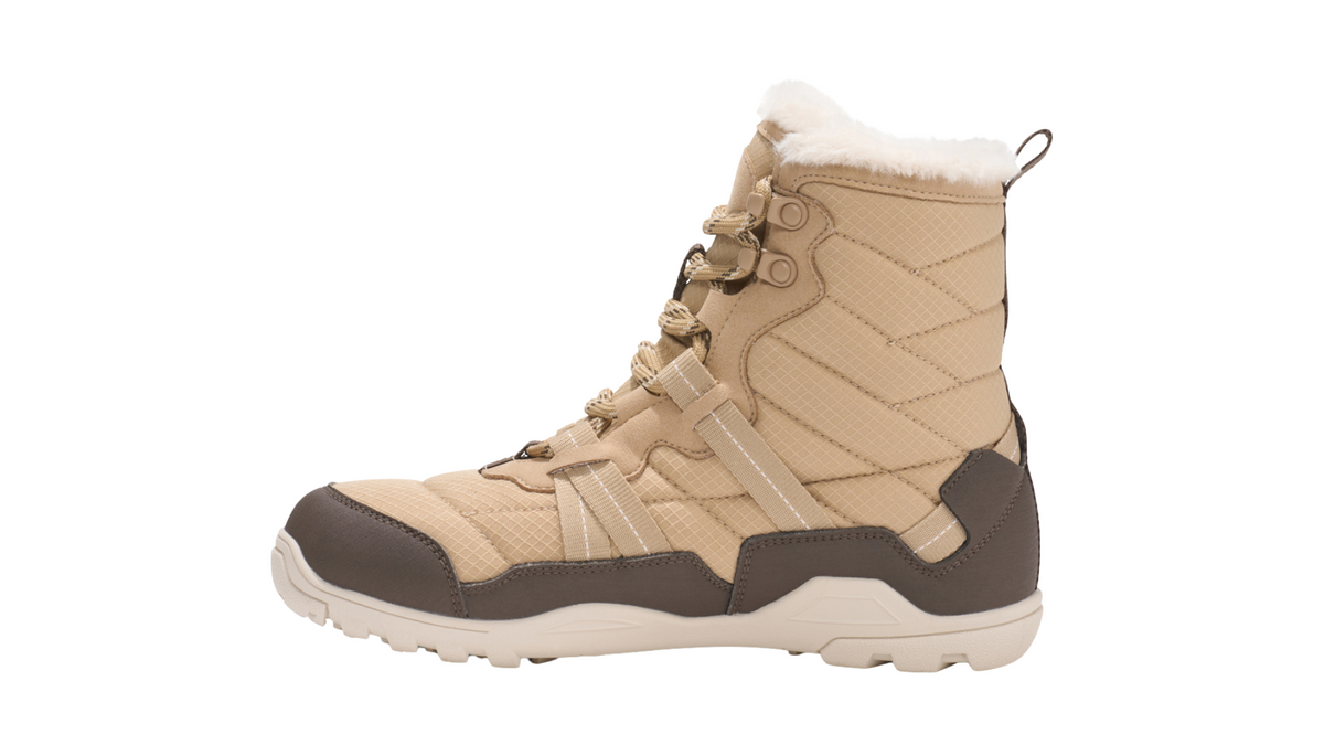 Barfußwinterstiefel, geschlossene Zehen und geschlossener Fersenbereich, Schnürung mit Ösen, profilierte Sohle, Einzelschuh, Seitenansicht innen