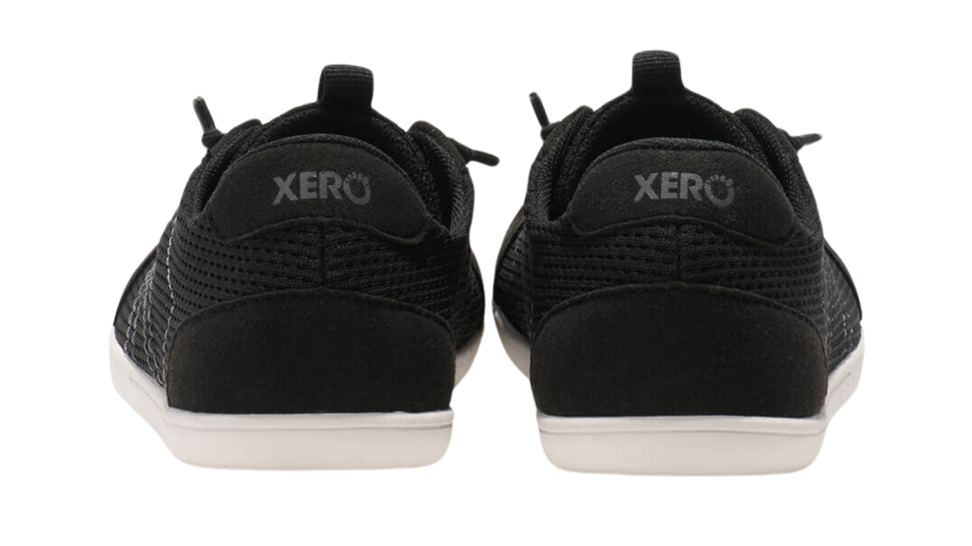 Barfußschuh mit Schnürung, breite Zehenbox, flexible Sohle, geschlossener Fersenbereich, Rückansicht als Paar