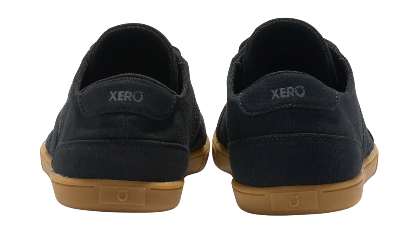 Barfußschuh mit Schnürung, breite Zehenbox, flexible Sohle, geschlossener Fersenbereich, Rückansicht als Paar
