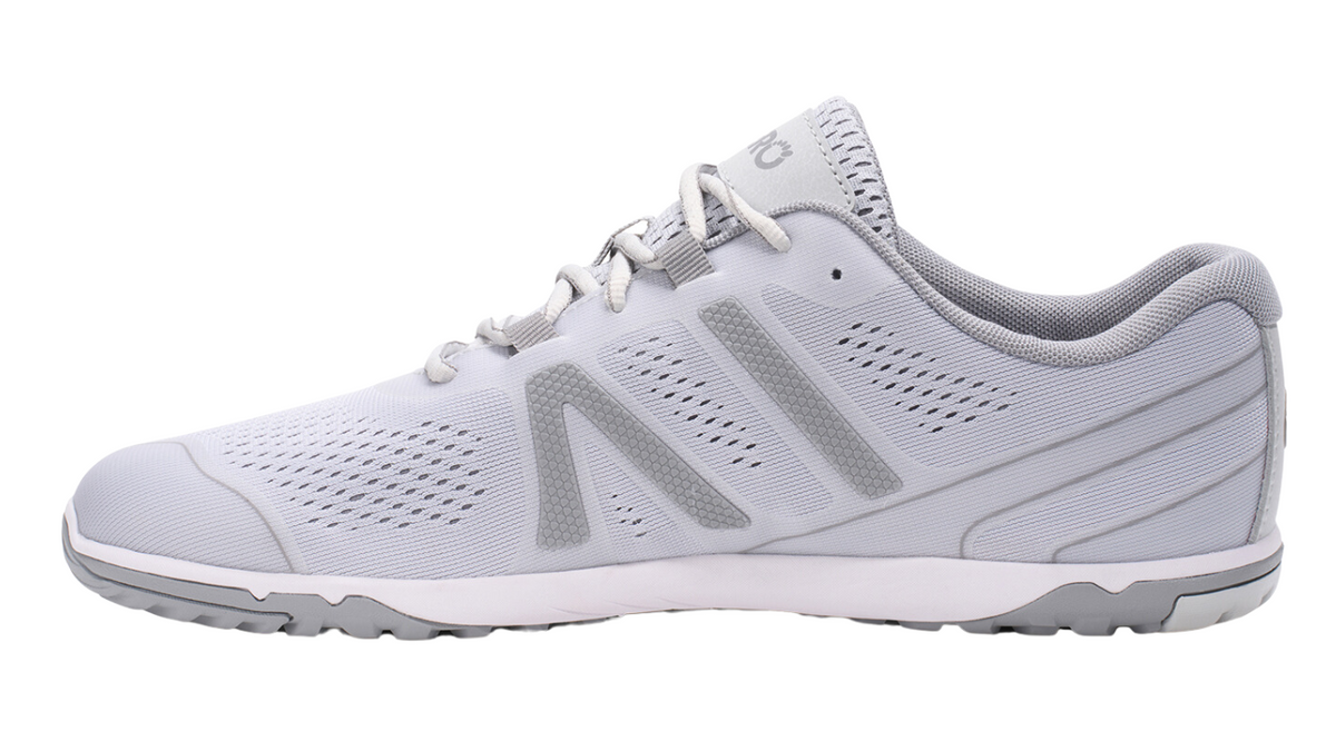 Barfußschuh, geschlossene Zehen und geschlossener Fersenbereich, Schnürung, profilierte Sohle, Einzelschuh, Seitenansicht innen