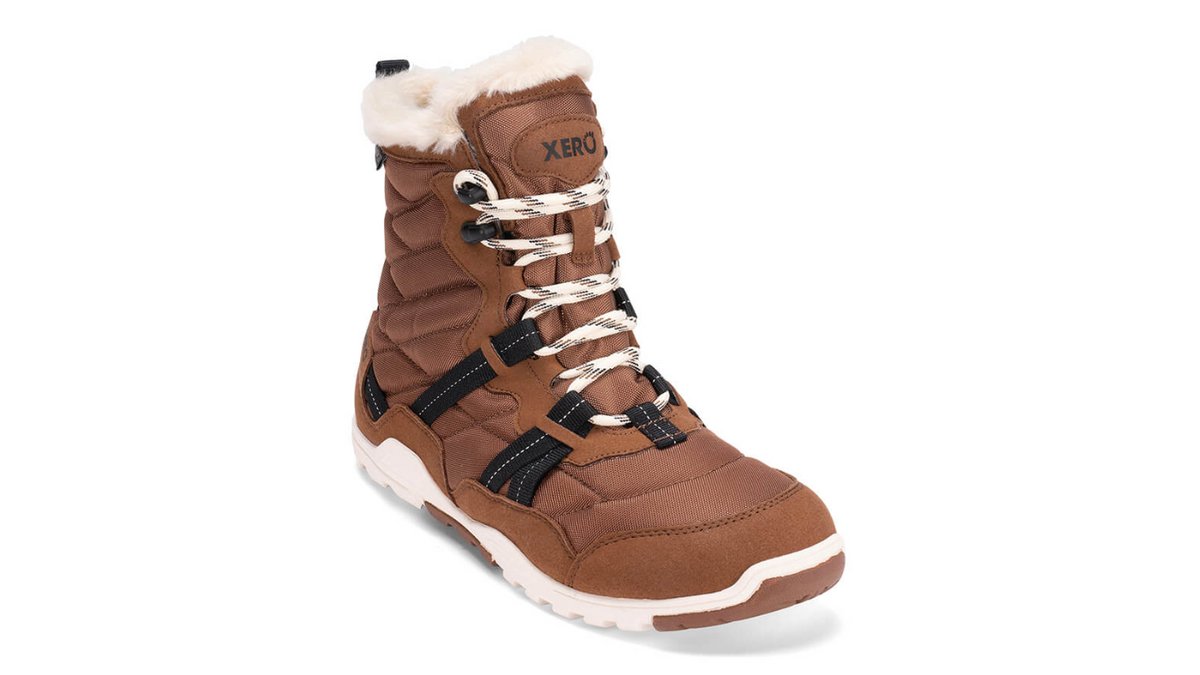 Barfußwinterstiefel, geschlossene Zehen und geschlossener Fersenbereich, Schnürung mit Ösen, profilierte Sohle, Einzelschuh, schräge Vorderansicht