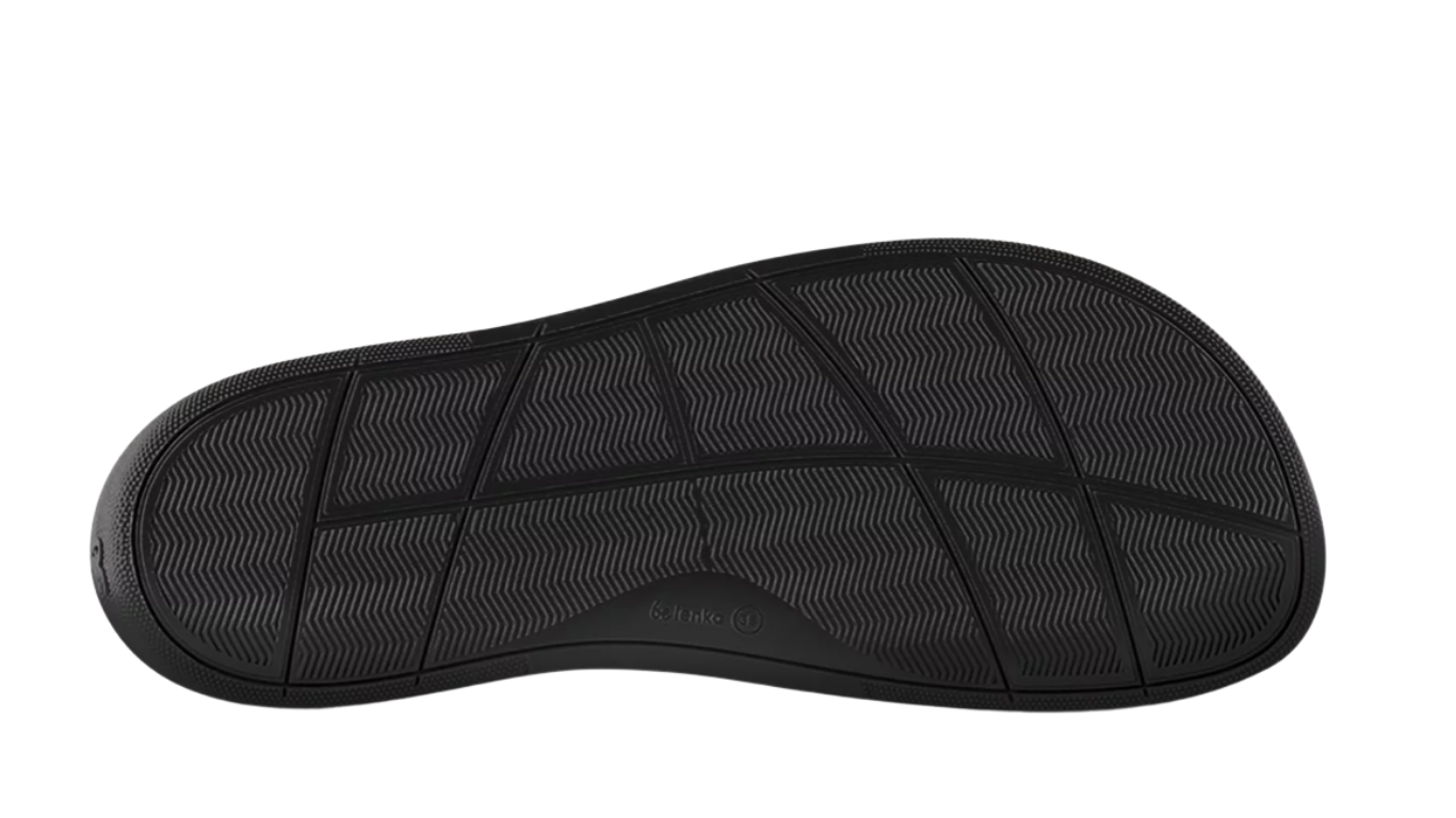 Barfußloafer, Ansicht von unten. Einzelansicht der flachen, flexiblen Sohle mit Profilstruktur.