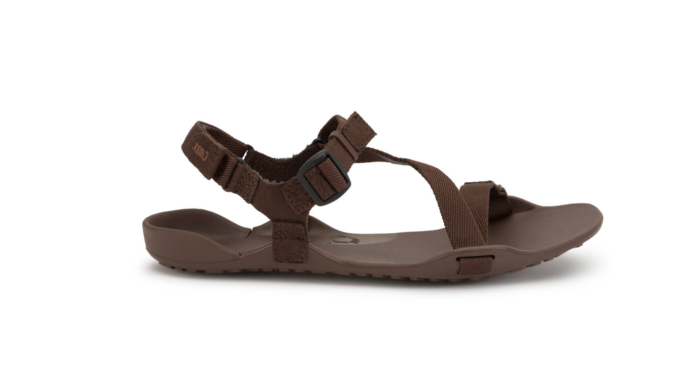 Barfußsandale, offene Zehen und offener Fersenbereich, Riemenkonstruktion mit verstellbaren Riemen, flexible Sohle, Einzelschuh, Seitenansicht außen