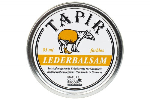Lederbalsam in runder Metalldose mit Schraubdeckel und Etikett, Draufsicht