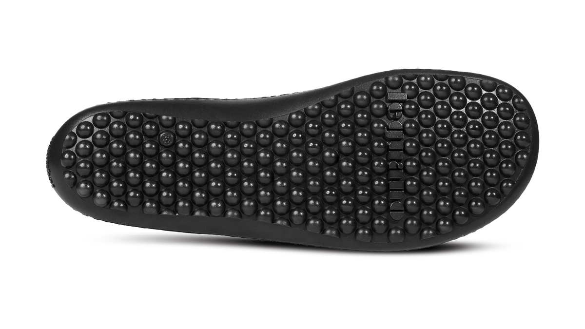 Barfußschuh mit flexibler Laufsohle und runden Profilnoppen, Ansicht von unten