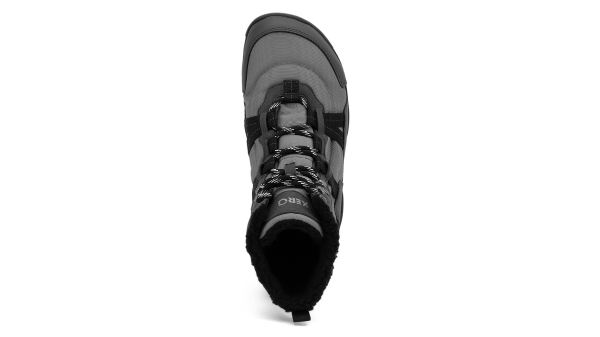 Barfußwinterstiefel, geschlossene Zehen und geschlossener Fersenbereich, Schnürung mit Ösen, profilierte Sohle, Einzelschuh, Draufsicht