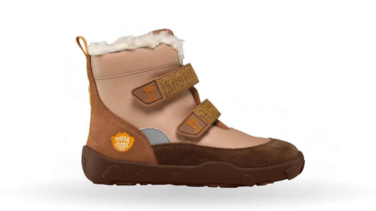 Gefütterter Kinder-Barfußwinterstiefel mit breiter Zehenbox, zwei Klettverschlüssen und hochgezogener Sohle, Seitenansicht außen
