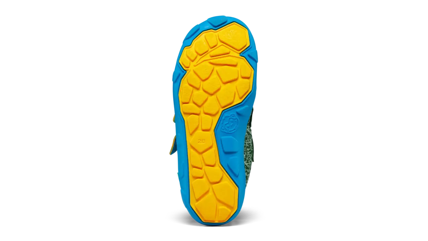Kinder-Barfußschuh mit flacher, flexibler Sohle und strukturiertem Profil, Ansicht von unten.