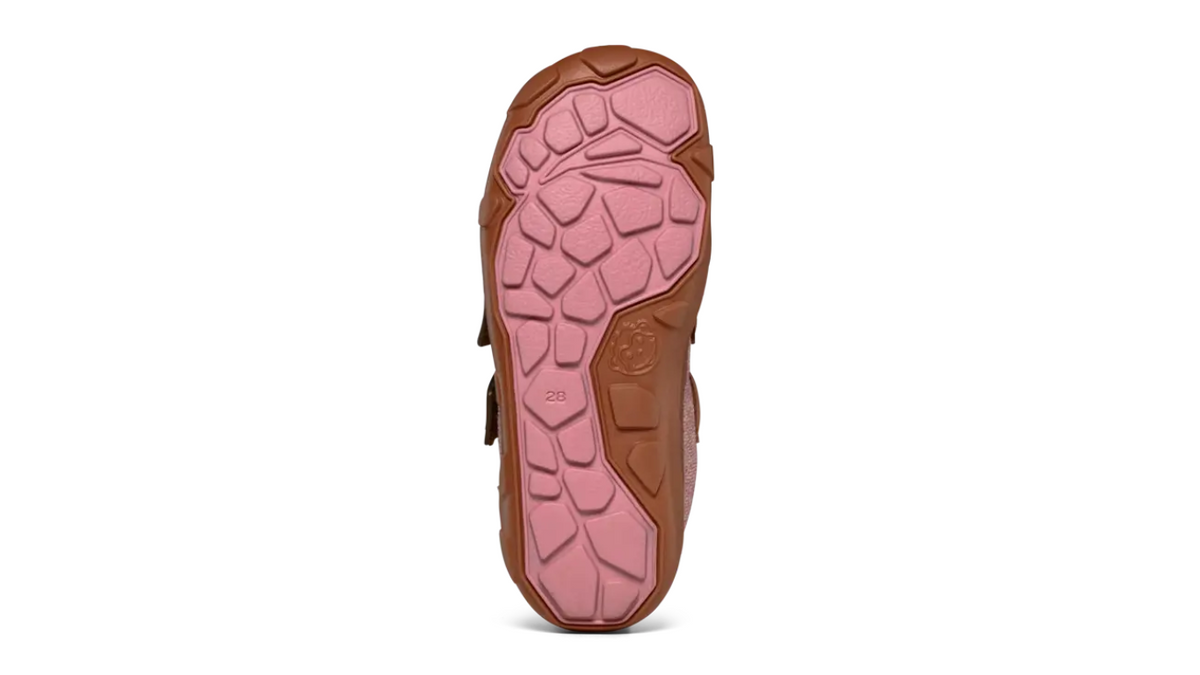Kinder-Barfußschuh mit flacher, flexibler Sohle und strukturiertem Profil, Ansicht von unten.