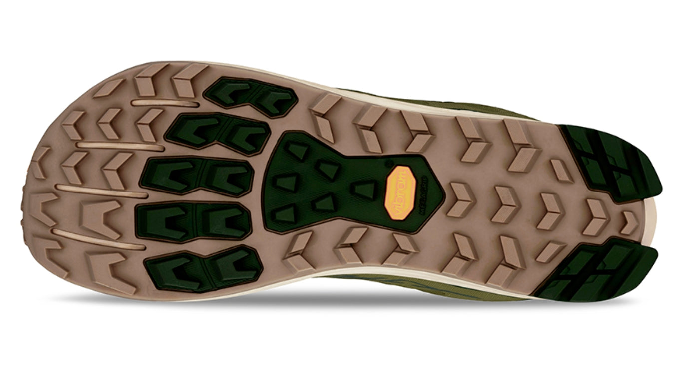 Trailrunningschuh, Ansicht von unten. Grob profilierte Laufsohle mit offenem Stollenmuster.