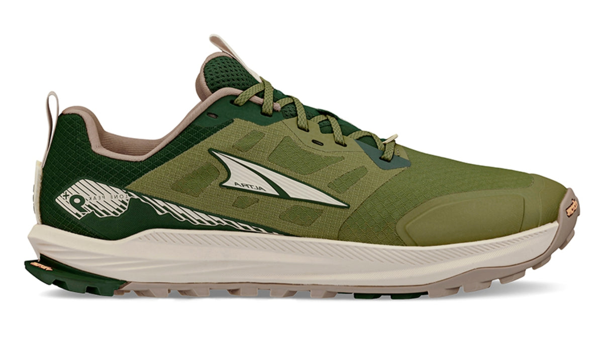 Trailrunningschuh, flache geschlossene Ausführung, Seitenansicht rechts Außenseite. Schnürung, niedrig geschnittener Schaft, stark profilierte Sohle.