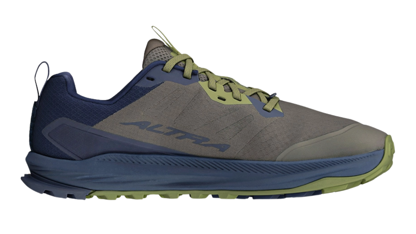 Trailrunningschuh, flache geschlossene Ausführung, Seitenansicht rechts Innenseite. Schnürung, niedrig geschnittener Schaft, stark profilierte Sohle.